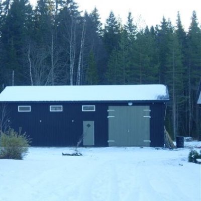 Traktorgarage kombinerat med stall